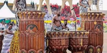 Drummers performing at Talking Drums Festival – a major event among drumming festivals in Africa.