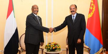“Sudan-Eritrea leaders discussing regional stability in Africa during diplomatic visit.”