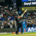 Action in Indore: Mitchell Powers Through New Zealand’s Daryl Mitchell plays a commanding shot during the high-stakes new zealand vs india 3rd ODI at the Holkar Cricket Stadium.