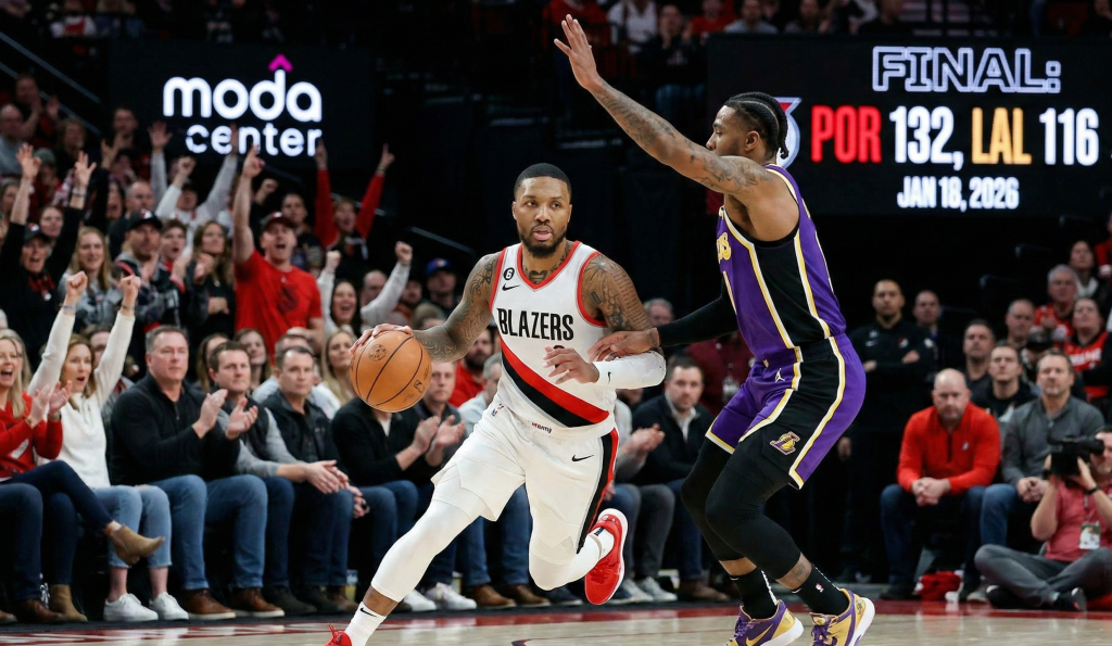 A Portland Trail Blazers guard drives against a Los Angeles Lakers defender during the trail blazers vs lakers game at the Moda Center on January 18, 2026, which ended in a 132-116 victory for Portland.