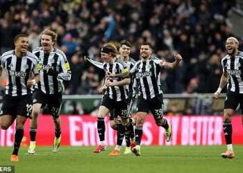 Antoine Semenyo celebrates his debut goal as man city cruise to a historic 10-1 FA Cup victory at the Etihad Stadium.