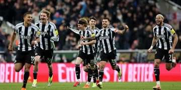 Antoine Semenyo celebrates his debut goal as man city cruise to a historic 10-1 FA Cup victory at the Etihad Stadium.